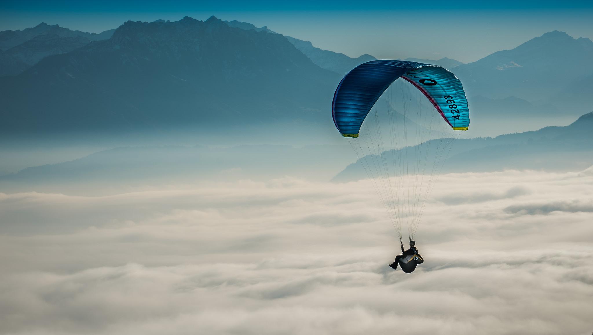 paragliding-sky-clouds